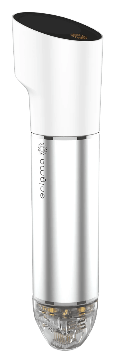 Enigma’s silver handheld RF microneedling device with an integrated touchscreen and clear cartridge